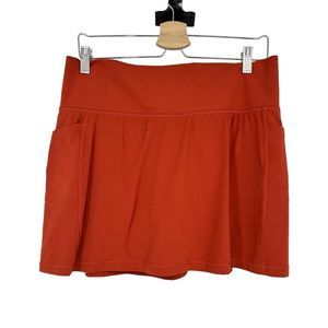 Athleta Salutation Stash 14.5" Skort Burnt Orange Skirt w Shorts Pockets Size L